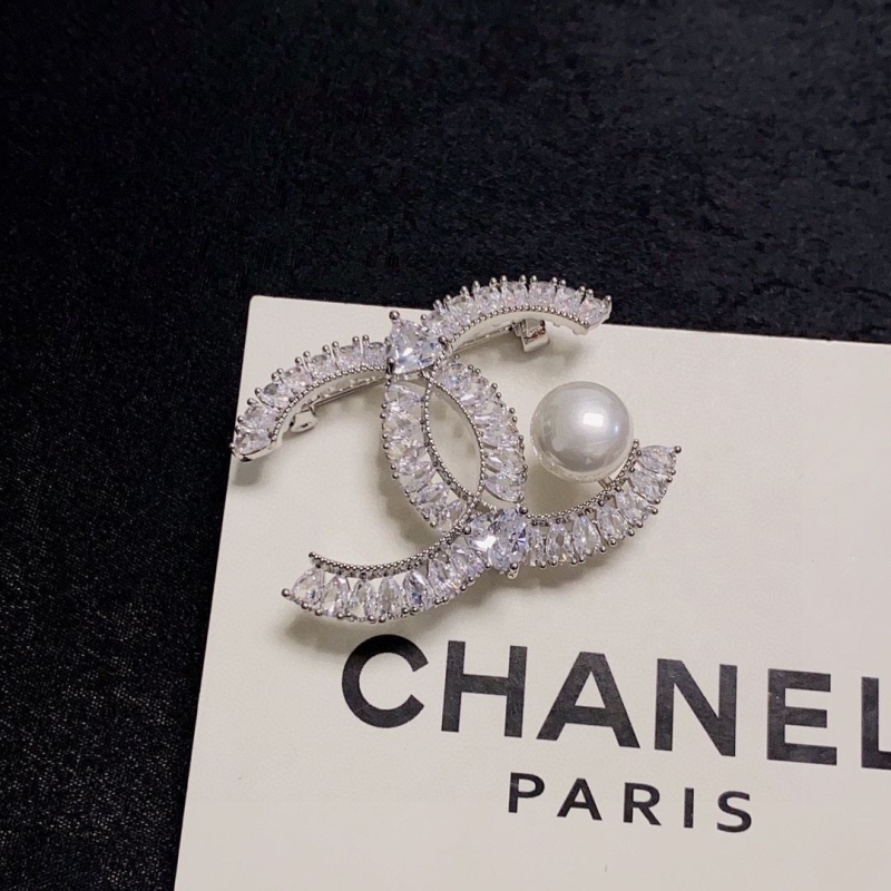 Ch**el brooches